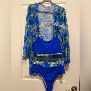 Bathing suit coverup and 2 piece suit. New